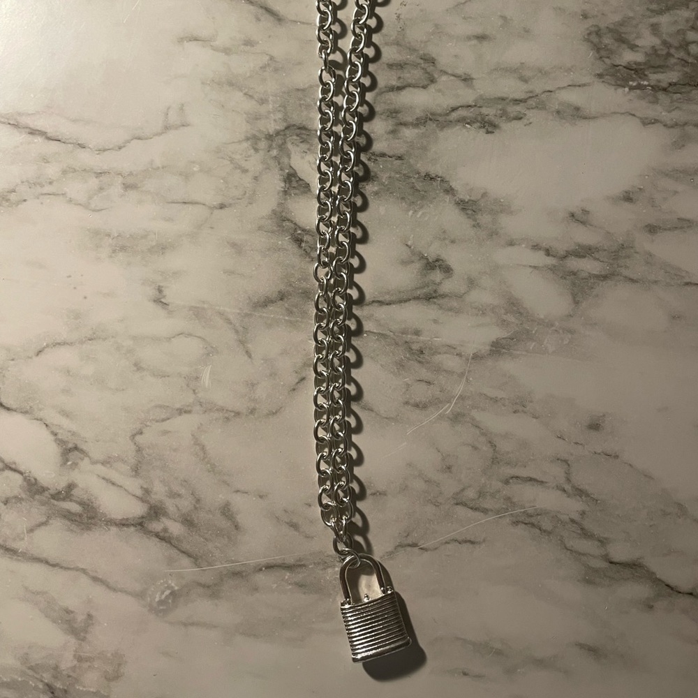 A brand new brandy melville lock necklace